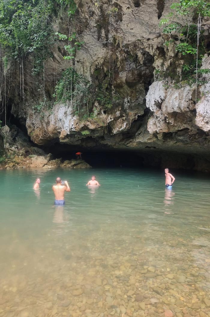 A river flowing out of a cave in Belize